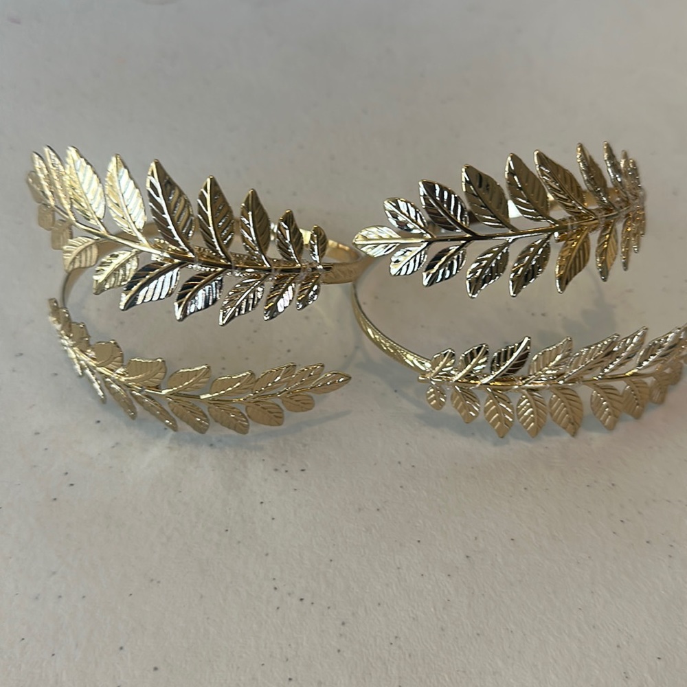 Gold arm bracelets